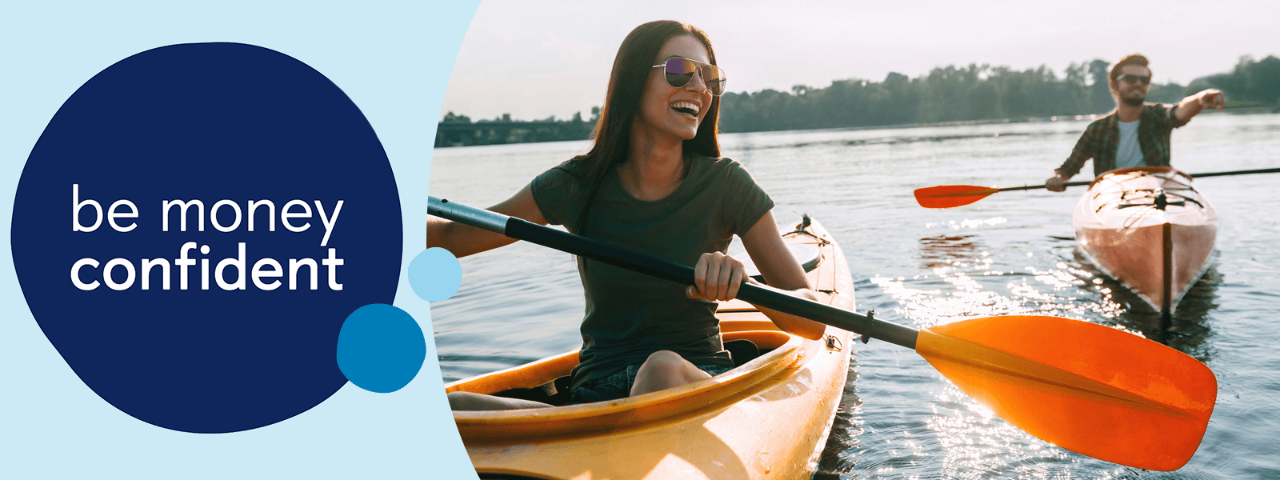 Couple kayaking in separate kayaks