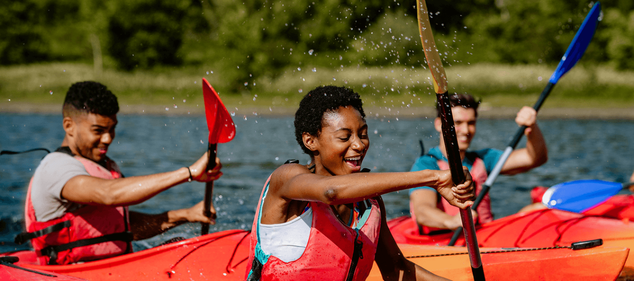 Group of kayakers paddling